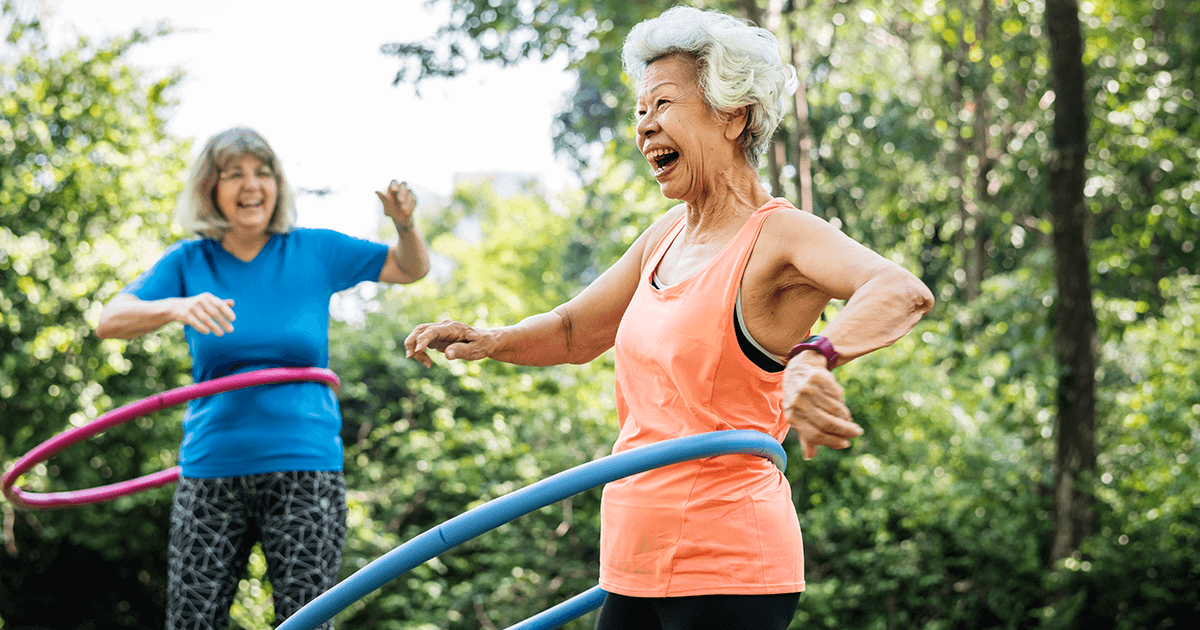 Elderly Woman Balancing a Hoola Hoop