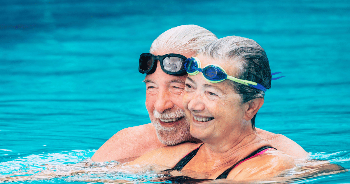 seniors in pool with adult swim diapers