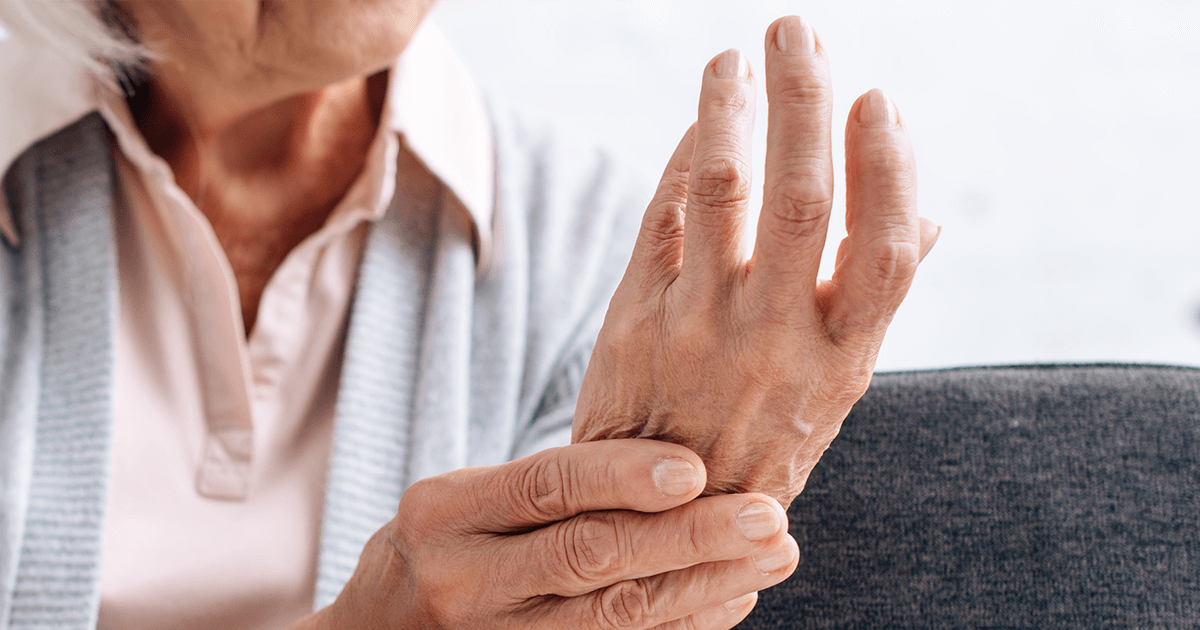 Elderly woman with arthritis pain