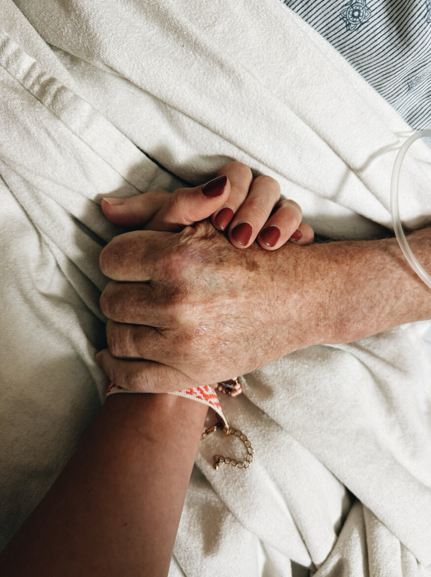 Trevor Polder with daughter Rebekah holding hands