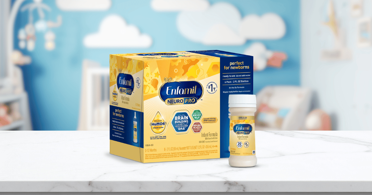 Enfamil NeuroPro infant formula box and ready-to-use bottle on a white marble surface